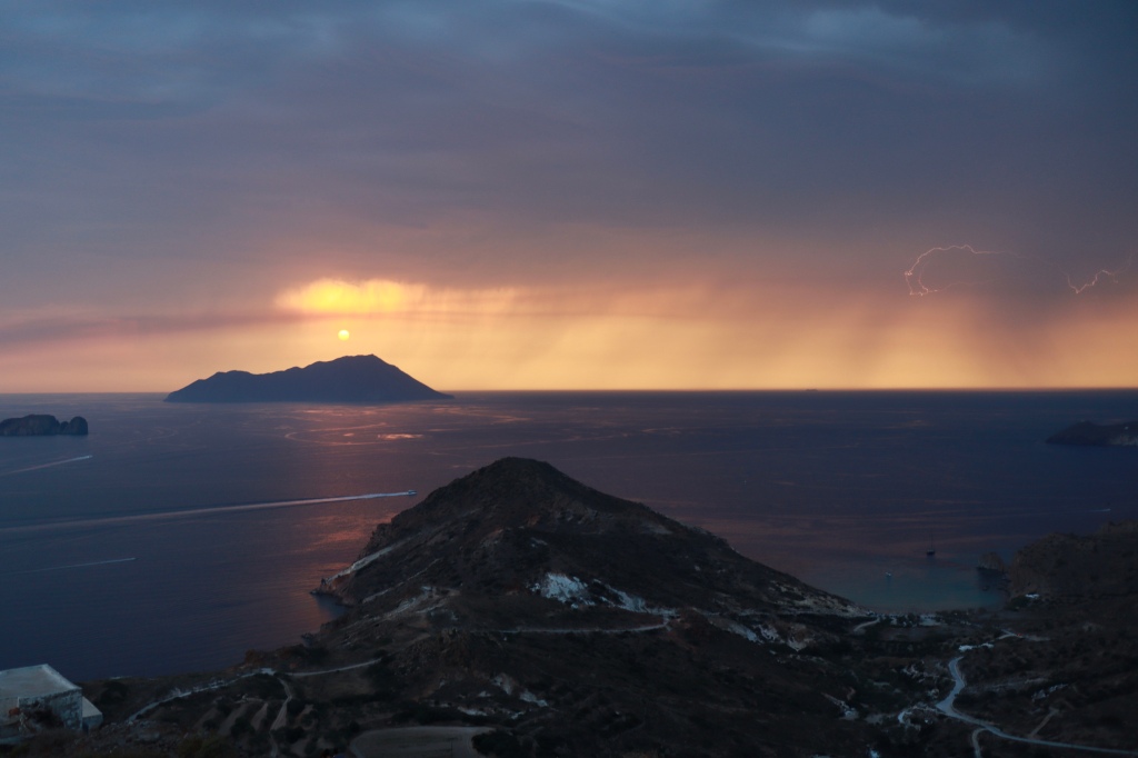 Sunset at Plaka castle while storming